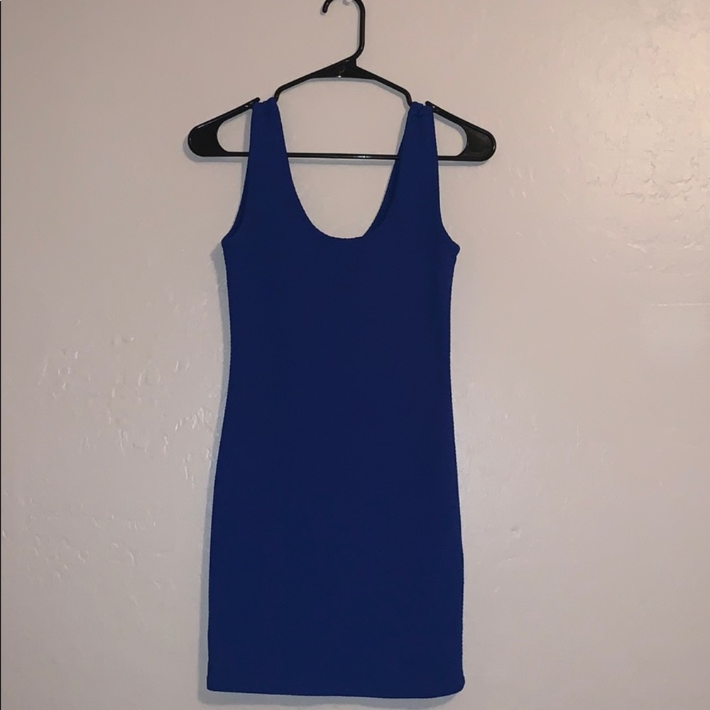 Blue bodycon dress.